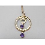 AN EDWARDIAN 9CT YELLOW GOLD AMETHYST AND SEED PEARL DROPLET PENDANT ON GILT METAL CHAIN 1.6G