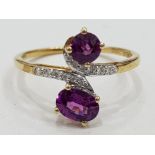 10CT YELLOW GOLD RING WITH TWIN AMETHYSTS AND DIAMONDS, 1.7G GROSS SIZE Q