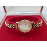 A 9CT YELLOW GOLD OMEGA LADIES COCKTAIL WATCH ON 9CT GOLD STRAP 14.4G GROSS BOXED WITH SERVICE