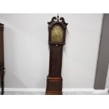 A 19TH CENTURY CARVED OAK LONGCASE CLOCK BY R FOSTER CARLISLE HANDPAINTED MOON AND SUN ABOVE BRASS