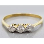 AN 18CT YELLOW GOLD AND DIAMOND THREE STONE RING SIZE P 1/2 1.6G GROSS
