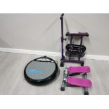 A VIBRAPOWER DISC 2 EXERCISE MACHINE TOGETHER WITH A LEG MATIC AND ONE OTHER