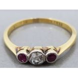 A 9CT YELLOW GOLD AND PLATINUM RUBY AND DIAMOND THREE STONE RING HALLMARKS RUBBED SIZE L 1.7G GROSS