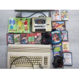 FULLY WORKING COMMODORE 64 WITH 2 JOYSTICKS AND 14 GAMES WITH WIRES PLUS MONITER