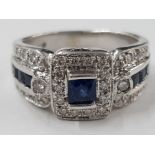 14CT WHITE GOLD DIAMOND AND SAPPHIRE CLUSTER RING DIAMOND SAPPHIRE SIDES, 5.6G SIZE K