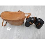 A PAIR OF TONICHI 12 X 50 FIELD BINOCULARS NO 37430 IN FITTED CASE