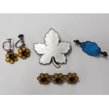 MEKA STERLING SILVER AND ENAMEL DANISH JEWELLERY COMPRISING A LEAF BROOCH AND BLUE LEAF BROOCH A