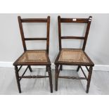A PAIR OF EARLY 20TH CENTURY MAHOGANY BEDROOM CHAIRS WITH CANEWORK SEATS