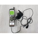A NOKIA BT CELLENT MOBILE PHONE WITH CHARGER