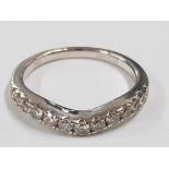 A 18CT WHITE GOLD AND DIAMOND WISHBONE PATTERN HALF ETERNITY RING SIZE J 2.8G GROSS