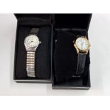 TWO LADIES SEKONDA WRISTWATCHES WITH CHROME AND BLACK LEATHER STRAPS IN ORIGINAL BOXES