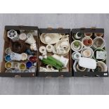 A COLLECTION OF PLANTERS, CREAM CHINA AND TEA LIGHT HOLDERS