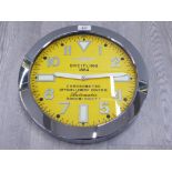 A BREITLING WALL CLOCK WITH YELLOW DIAL 34CM DIAMETER