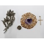 A MARCASITE FLORAL PATTERN BROOCH A MARCASITE SILVER CLIP ON EARRING AN AMETHYST AND GILT METAL NEST