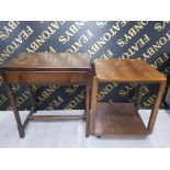 A VINTAGE MAHOGANY HALL UNIT TOGETHER WITH A 2 TIER OCCASIONAL TABLE ON CASTORS