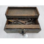 A VINTAGE WOODEN TOOLBOX WITH CONTENTS