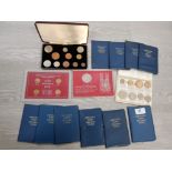VARIOUS MIXED COIN SETS ALL IN FOLDERS AND CASES UNC