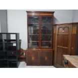 A 19TH CENTURY INLAID MAHOGANY BOOKCASE WITH CUPBOARD BELOW 121 X 244 X 62CM BASE MISSING