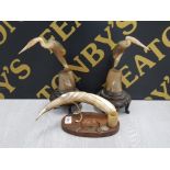 PAIR CARVED HORN MANTLE ORNAMENTS IN THE FORM OF STORKS ON ORIENTAL CARVED WOOD BASES TOGETHER WITH