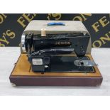 A VINTAGE JONES THREADLITE A1 SEWING MACHINE IN ORIGINAL CARRY CASE