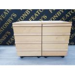 A PAIR OF BEECH EFFECT 4 DRAWER BEDSIDE CHESTS