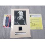 MARILYN MONROE CUT PIECE OF AN EVENING DRESS WORN BY HER AND ACCOMPANIED BY A LETTER OF