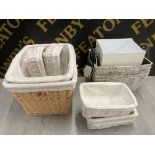 SIX WICKER STORAGE BASKETS OF DIFFERENT SIZES AND 5 OTHERS
