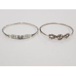 2 SILVER BANGLES OF DIFFERENT DESIGNS STAMPED CGL AND KH 15.7G