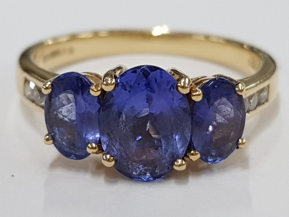 18CT YELLOW GOLD AND TANZANITE SET RING, CLARITY VS, COLOUR AAA MINIMUM, OVAL SHAPED CUT WITH