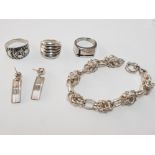 3 SILVER RINGS, 1 SILVER BRACELET AND 1 PAIR OF EARRINGS 67.6G GROSS