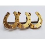 15CT YELLOW GOLD TRIPLE HORSE SHOE BROOCH 1.9G