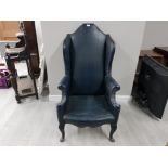 GEORGE III STYLE WINGBACK ARMCHAIR UPHOLSTERED IN BLUE LEATHERETTE WITH STUD DECORATION