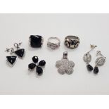 3 SILVER RINGS ONE WITH ONYX, ENAMEL AND WHITE STONE, 2 SILVER PENDANTS WITH WHITE AND BLACK STONE