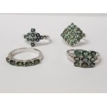 FOUR SILVER AND GREEN STONE RINGS OF VARIOUS DESIGNS STAMPED SIZES R 1/2 AND T 1/2 18.1 G GROSS