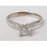 18CT WHITE GOLD DIAMOND SOLITAIRE RING ROUND BRILLIANT CUT STONE APPROXIMATELY .25CT SET IN A FOUR