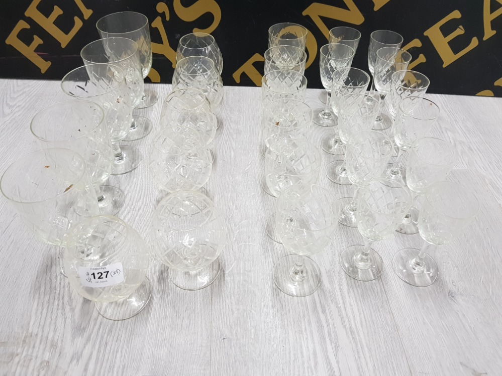 SUITE OF 29 PIECES OF CUT GLASS DRINKING GLASSES INCLUDING 8 LIQUEUR/WINE 6 BRANDY AND 6 GOBLETS