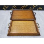 A VICTORIAN OAK TWIN HANDLED SERVING TRAY PLUS ONE OTHER TWIN HANDLED SERVING TRAY