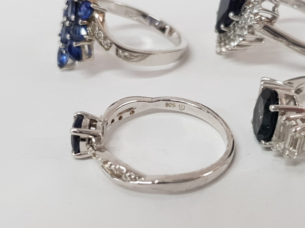 FOUR SILVER AND BLUE STONE RINGS STAMPED SIZES R 1/2 AND S 15.4G GROSS - Image 3 of 3