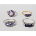 FOUR SILVER BLUE STONE AND PURPLE RINGS STAMPED ONE GILT SIZES S T AND T 1/2 12.5G GROSS