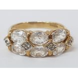 9CT YELLOW GOLD WHITE STONE AND DIAMOND CHIPS RING, 3.8G SIZE O