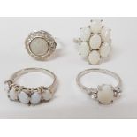 FOUR SILVER AND OPAL TYPE RINGS STAMPED SIZES R R 1/2 AND T 1/2 17.6G GROSS