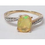 A 9CT YELLOW GOLD OPAL AND WHITE STONE RING SIZE R 1/2 2.3G GROSS