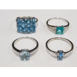 FOUR SILVER BLUE AND GREEN STONE RINGS STAMPED SIZES R S AND T 1/2 12.4G GROSS