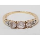 A 9CT YELLOW GOLD PINK STONE AND DIAMOND RING SIZE U 2.4G GROSS