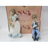 2 NAO BY LLADRO FIGURES, 1050 A FRIEND IN NEED AND 1001 TULIP TIME BOTH WITH ORIGINAL BOXES