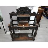 AN EARLY 20TH CENTURY HEAVILY CARVED OAK HALL STAND 123CM WIDE