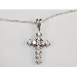 A STERLING SILVER CRUCIFIX WITH WHITE STONES ON A 925 SILVER TWISTED TRACE CHAIN 5.3G GROSS