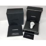 WHITE CERAMIC CHANEL J12 AUTOMATIC WRISTWATCH WITH WHITE METAL DIAMOND DOT DIAL AND DIAMOND BEZEL,