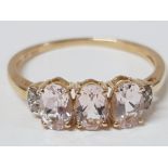 A 9CT YELLOW GOLD PINK AND WHITE STONE RING SIZE R 1/2 1.9G GROSS