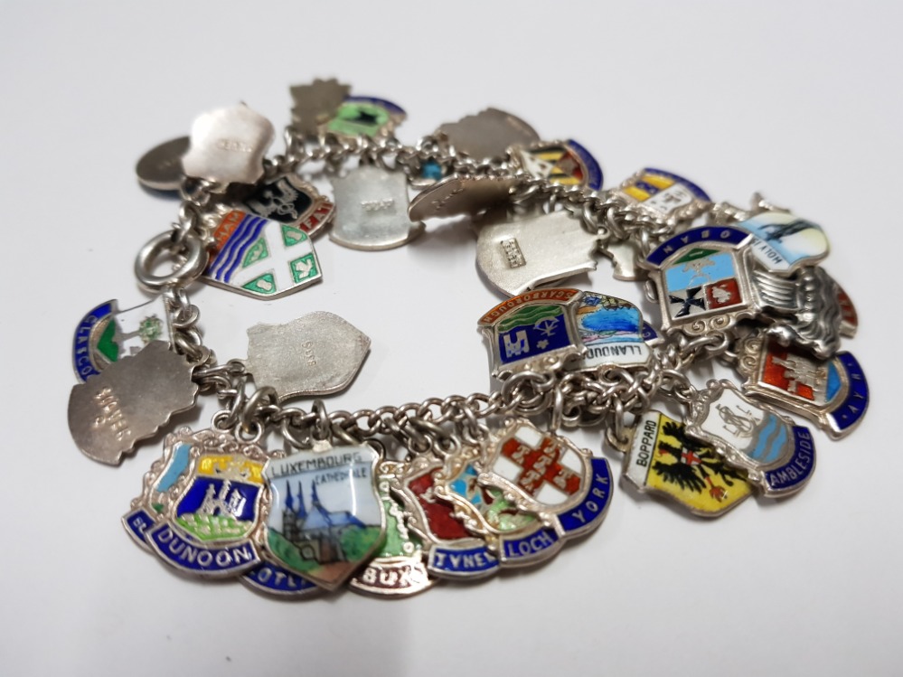 A SILVER BRACELET WITH APPROX 40 SILVER SOUVENIR SHIELDS 57.4G GROSS - Image 2 of 3